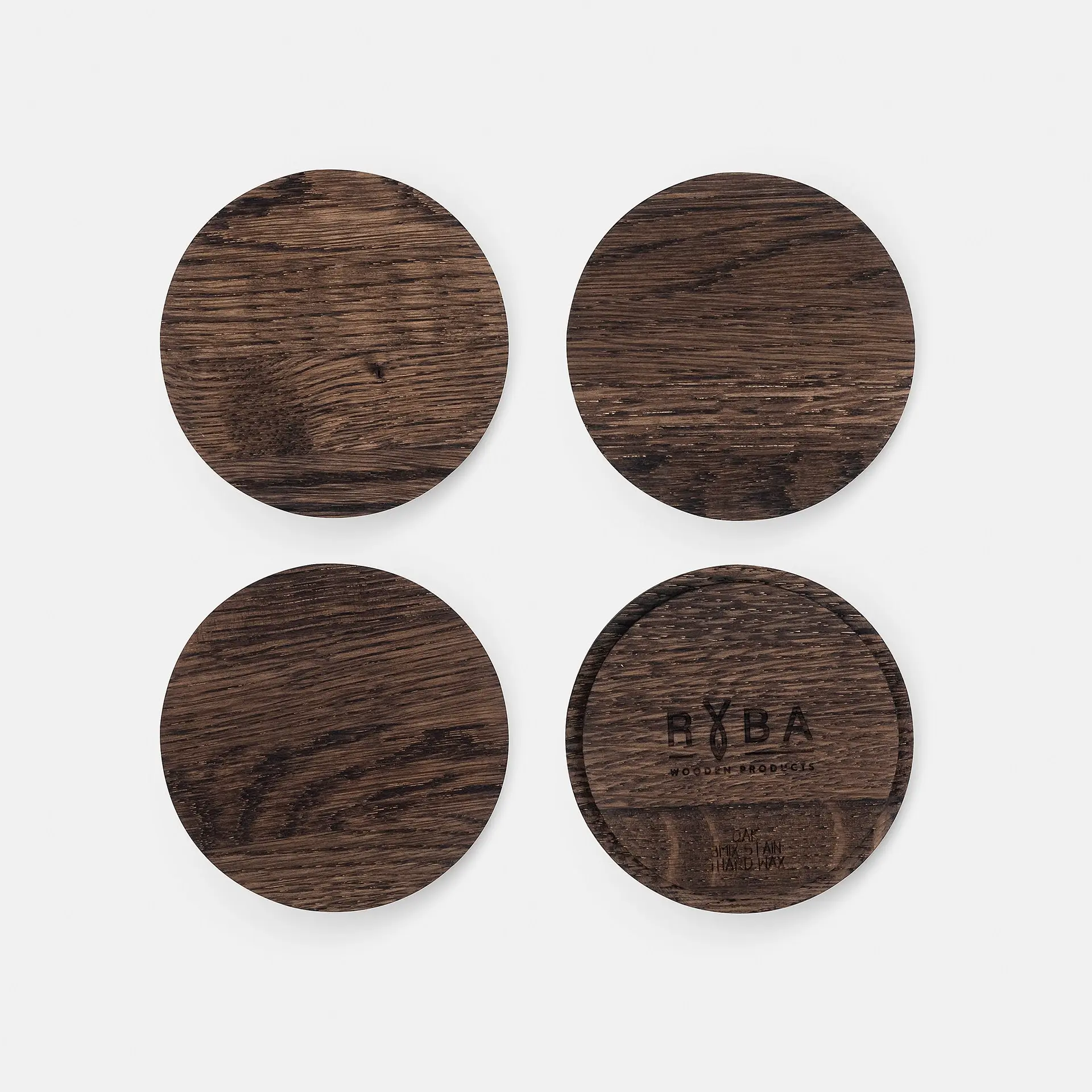 Ciemnobrązowe pokrywki do świec wyprodukowane w Polsce przez producenta wieczek,Dark brown wooden candle lids manufactured in Poland by a lid manufacturer